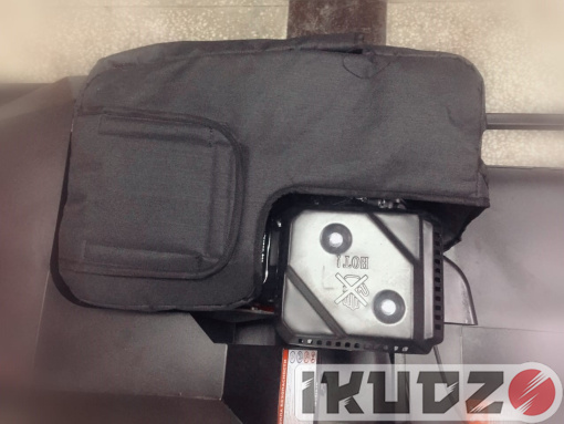 Engine cover for motorized towing vehicle IKUDZO